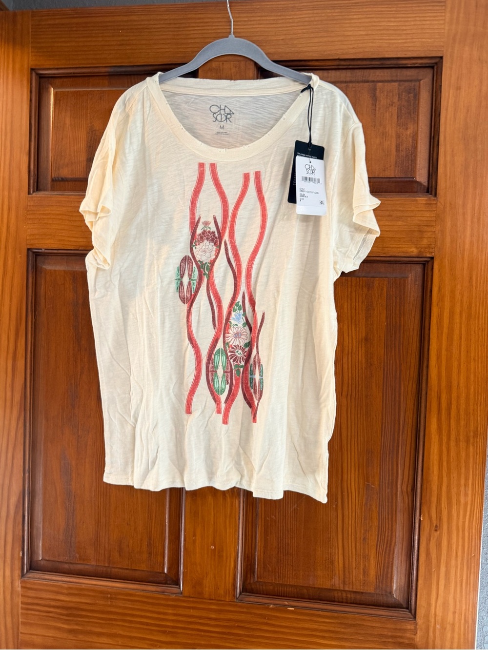 Chaser Cream Short Sleeve Tee with Red & Green Floral Graphic